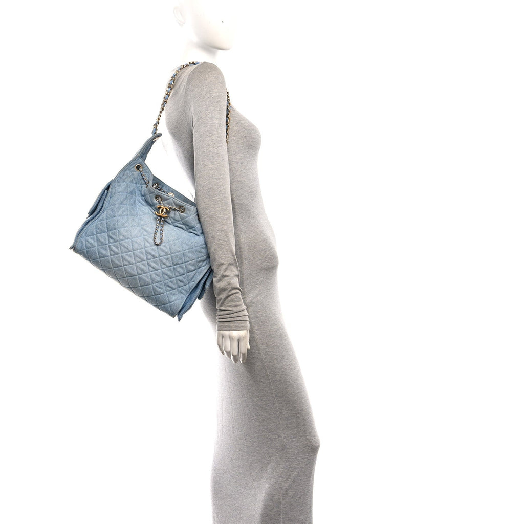 Washed Denim Quilted Medium Chanel 25 Handbag Blue