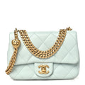 Caviar Quilted Mini Sweetheart Flap Light Blue