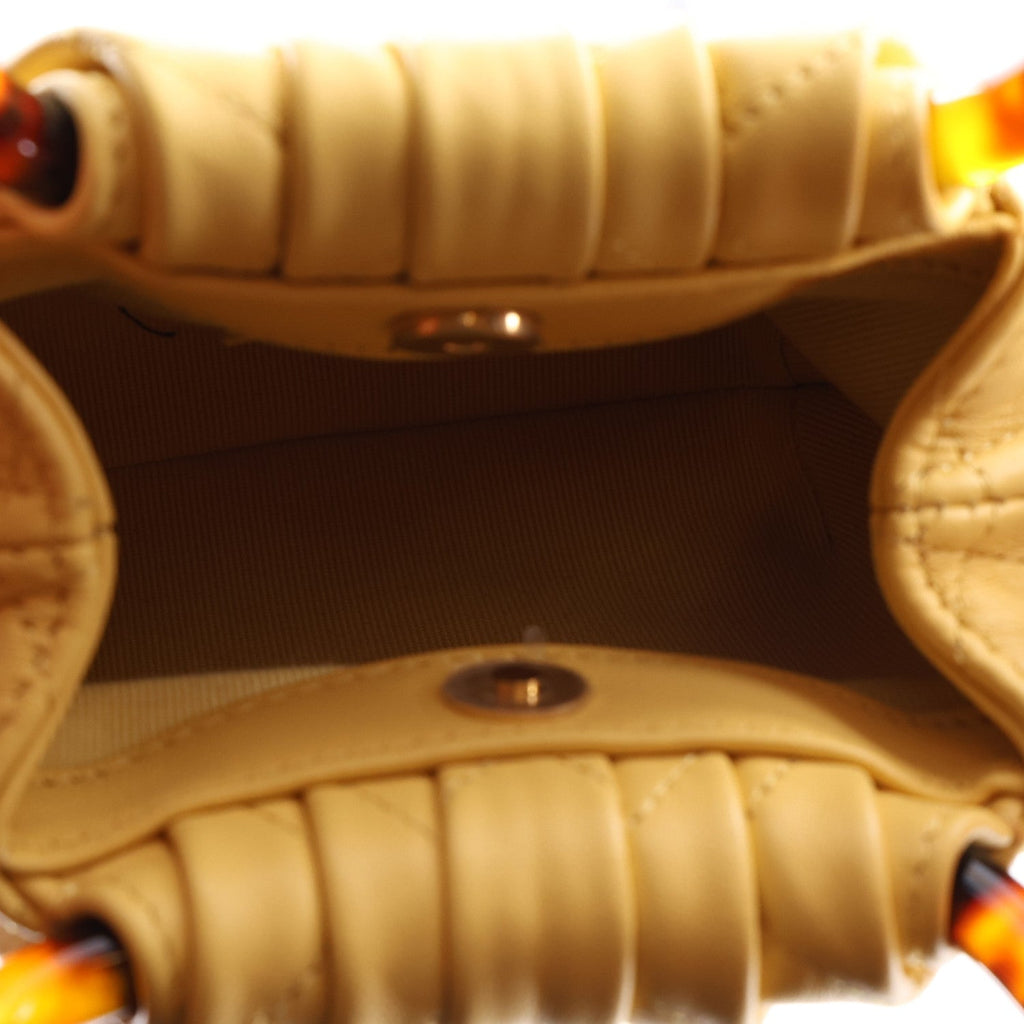 Lambskin Plexiglass Tortoise Shell Quilted Mini Pouch Yellow