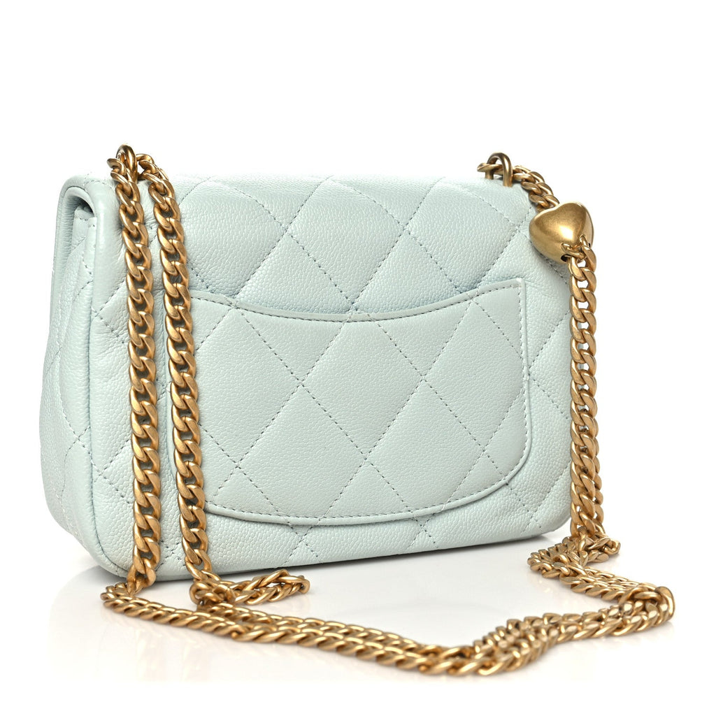 Caviar Quilted Mini Sweetheart Flap Light Blue