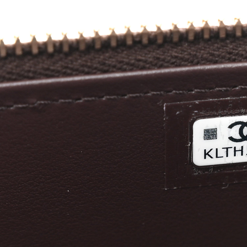 Caviar Quilted Top Handle Long Vanity Dark Brown