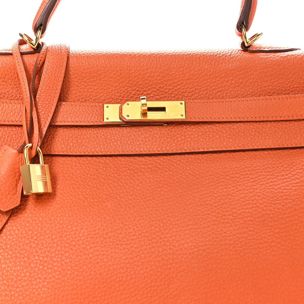 Togo Kelly Retourne 35 Orange